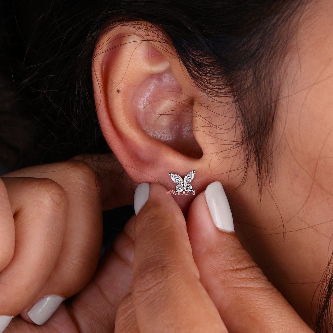 Prong settings earrings featuring Marquise Moissanite butterfly stud design.
