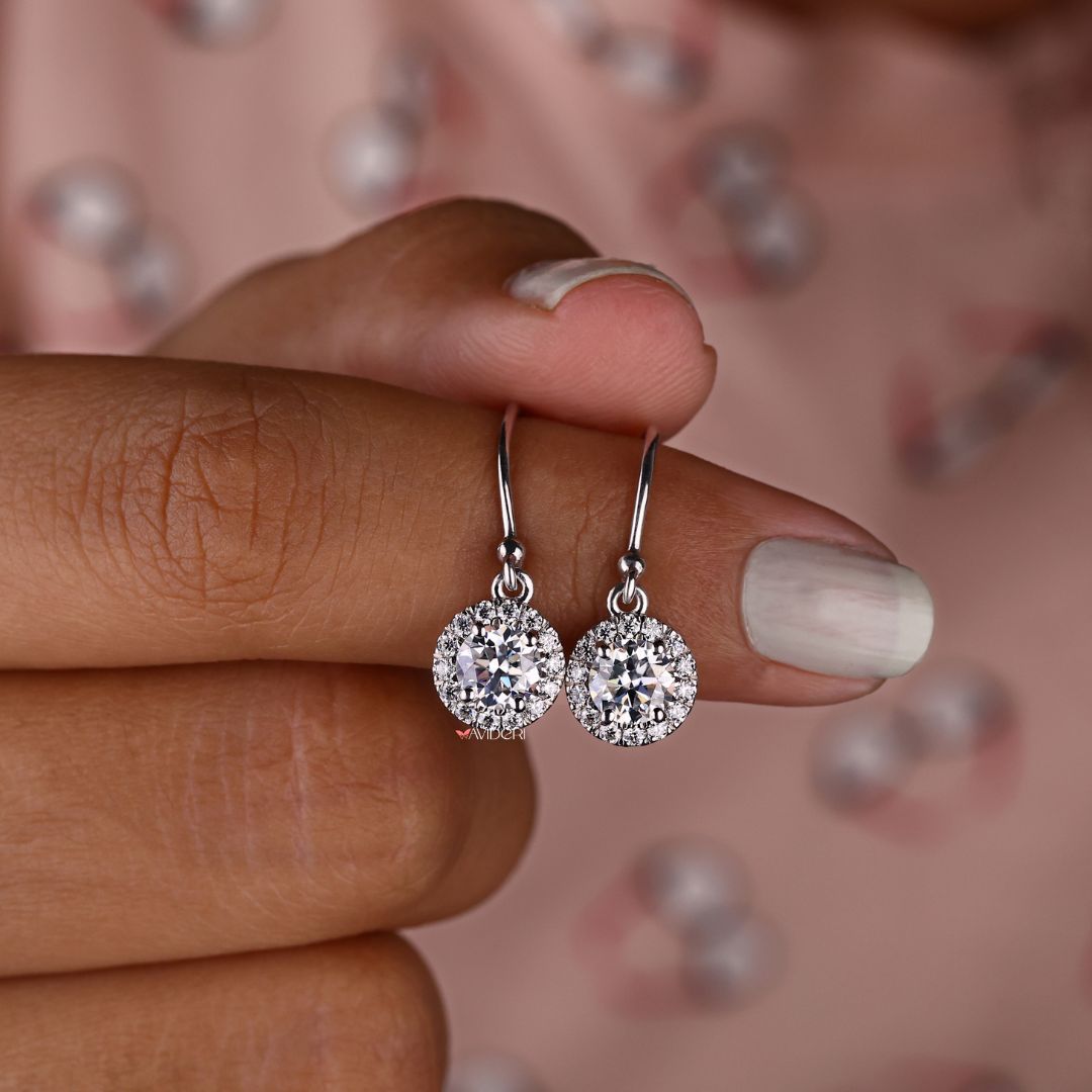 Beautiful round cut earrings with Moissanite halo earrings for extra sparkle.