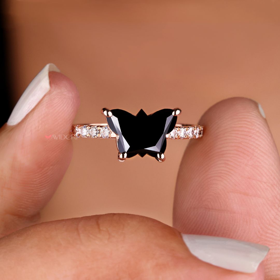 Pave band engagement ring with a black butterfly motif for sophistication.