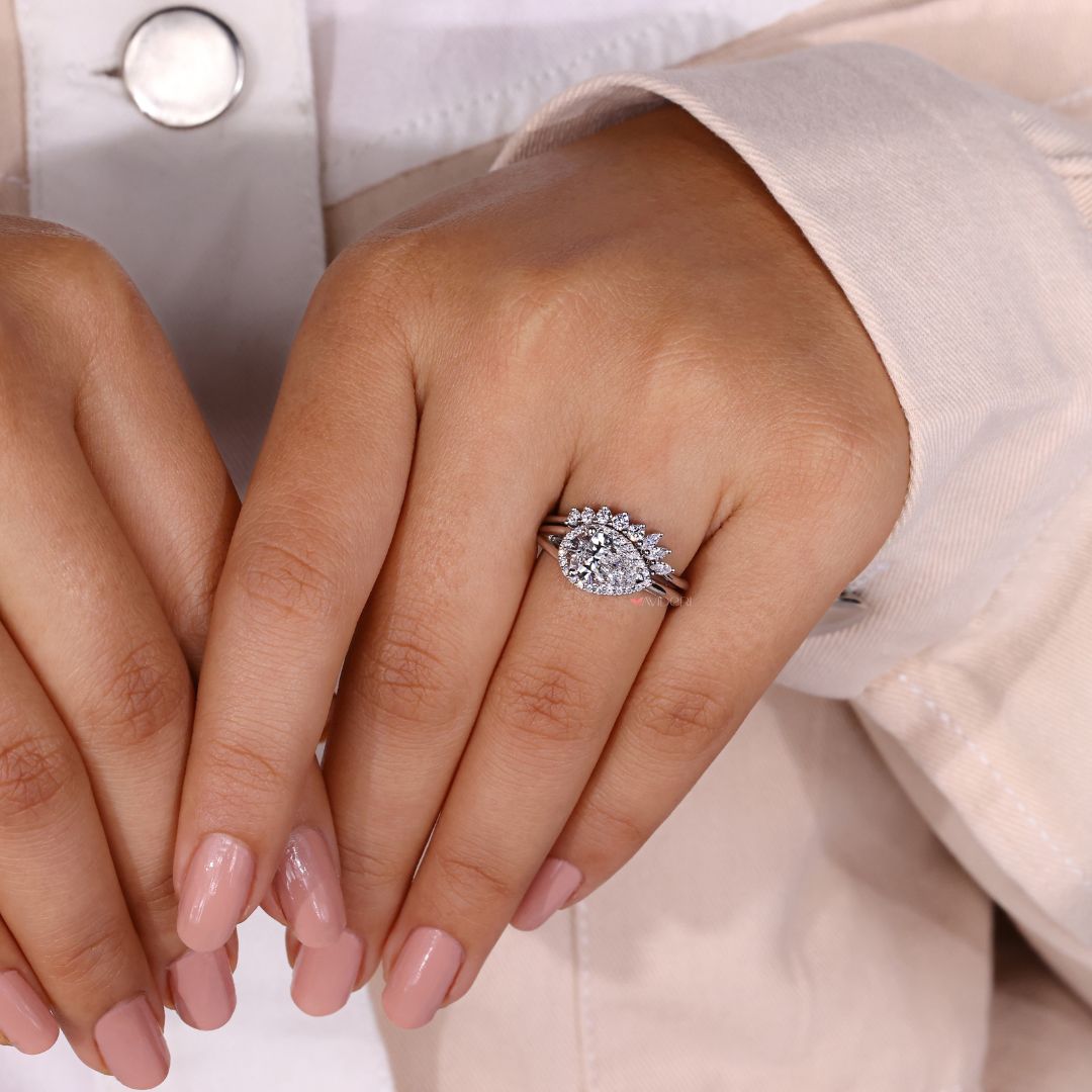 Curved wedding band fits flawlessly with statement engagement styles.