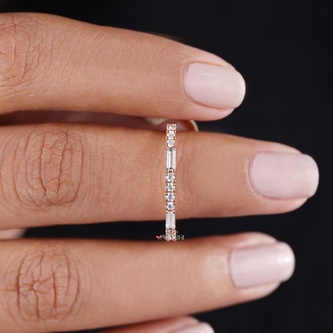 Baguette and round cut moissanite create a dynamic mix of sparkle and shape.