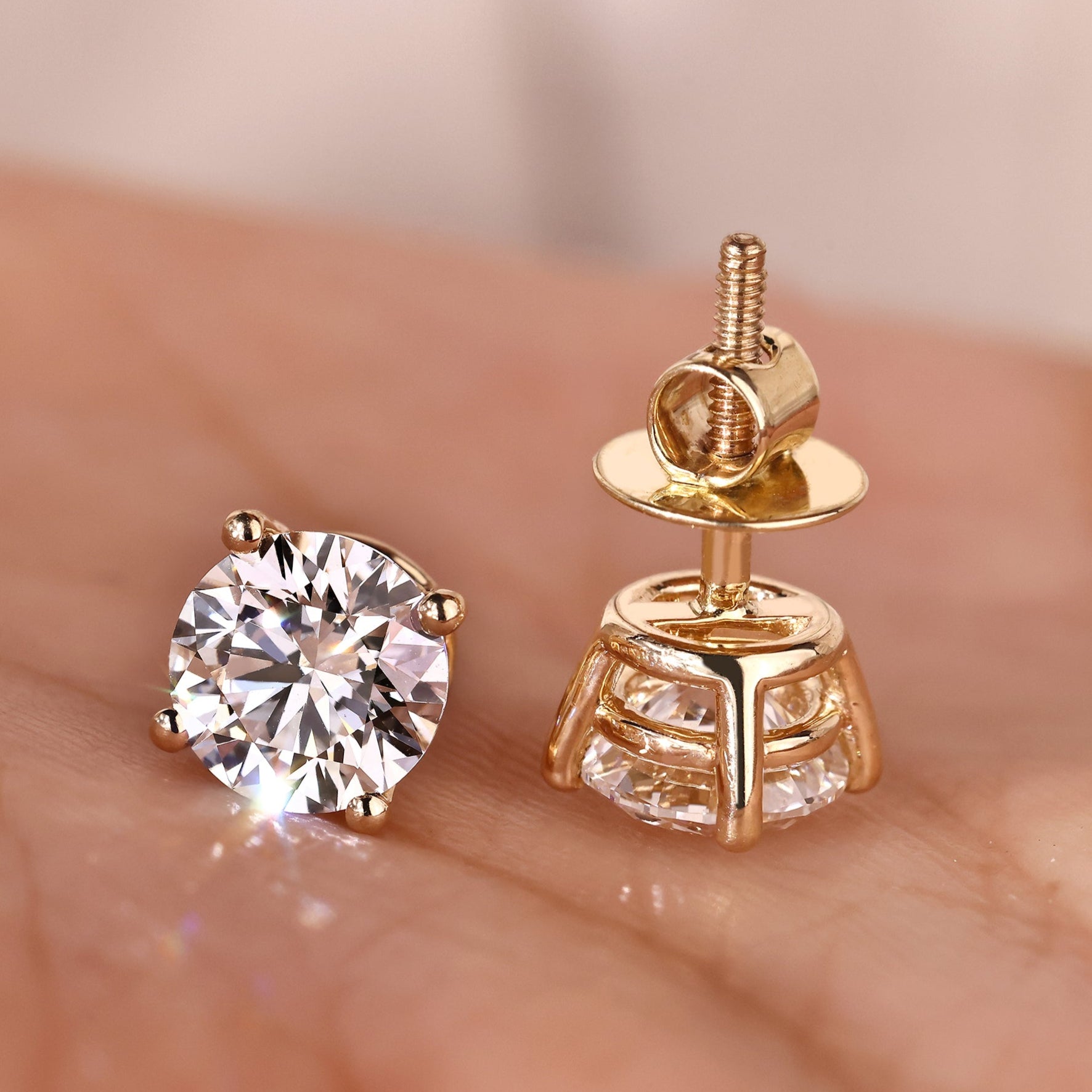 6mm round diamond earrings with screw back.
