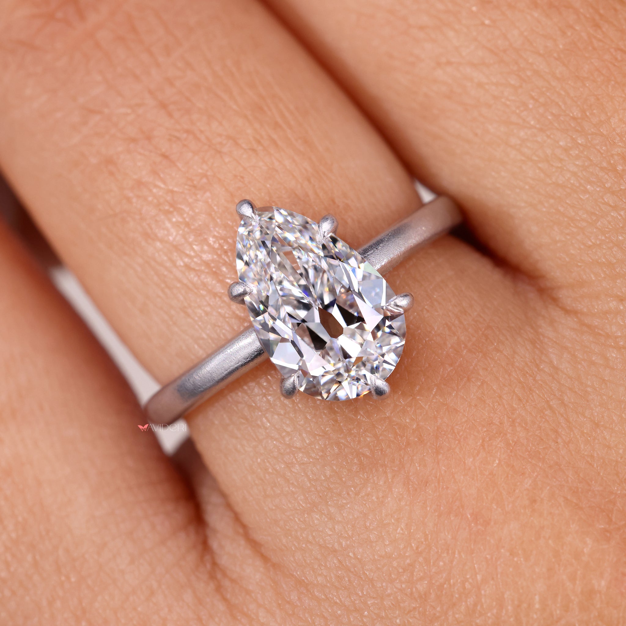 Stunning 6 prong engagement ring with a beautifully cut pear shape stone.