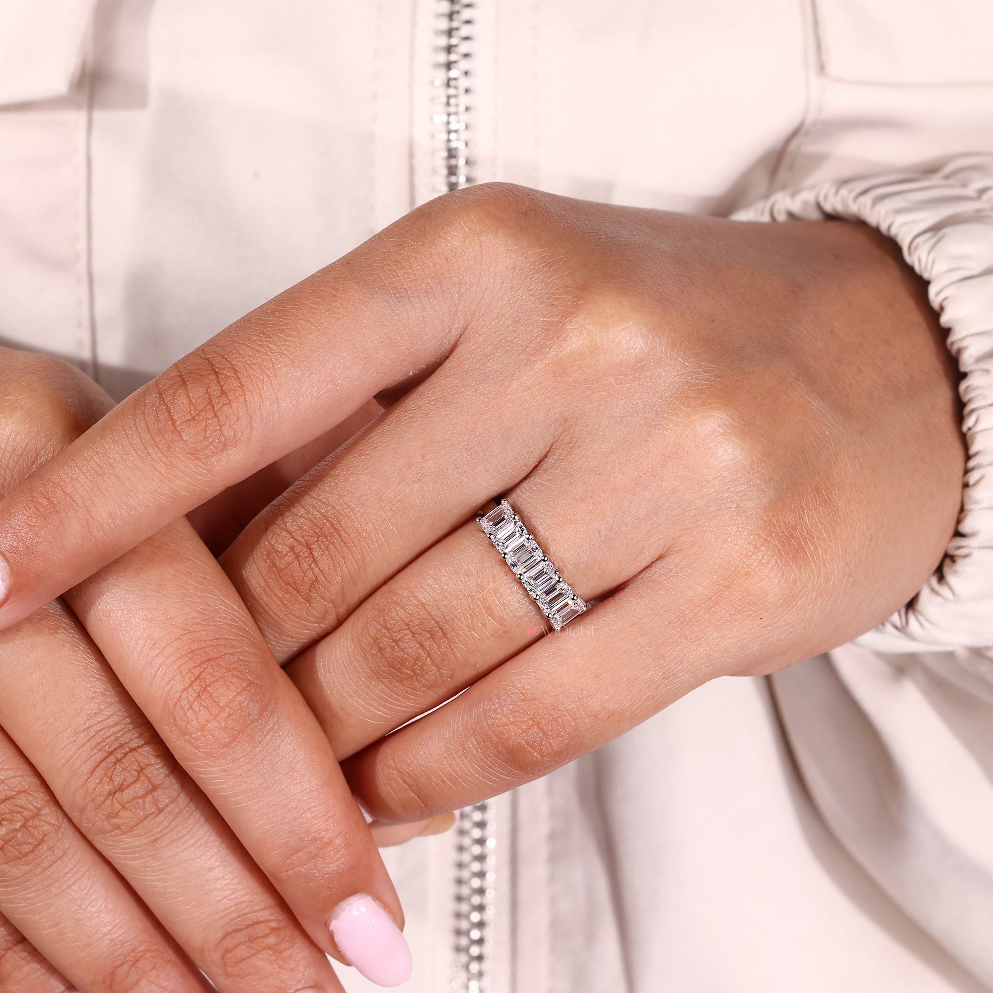 Emerald cut wedding band designed in white gold.