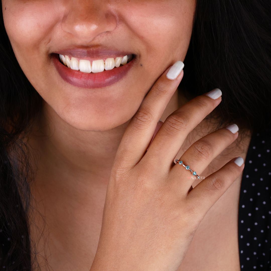 Rose gold band shines with a warm, rich tone that complements moissanite brilliance.