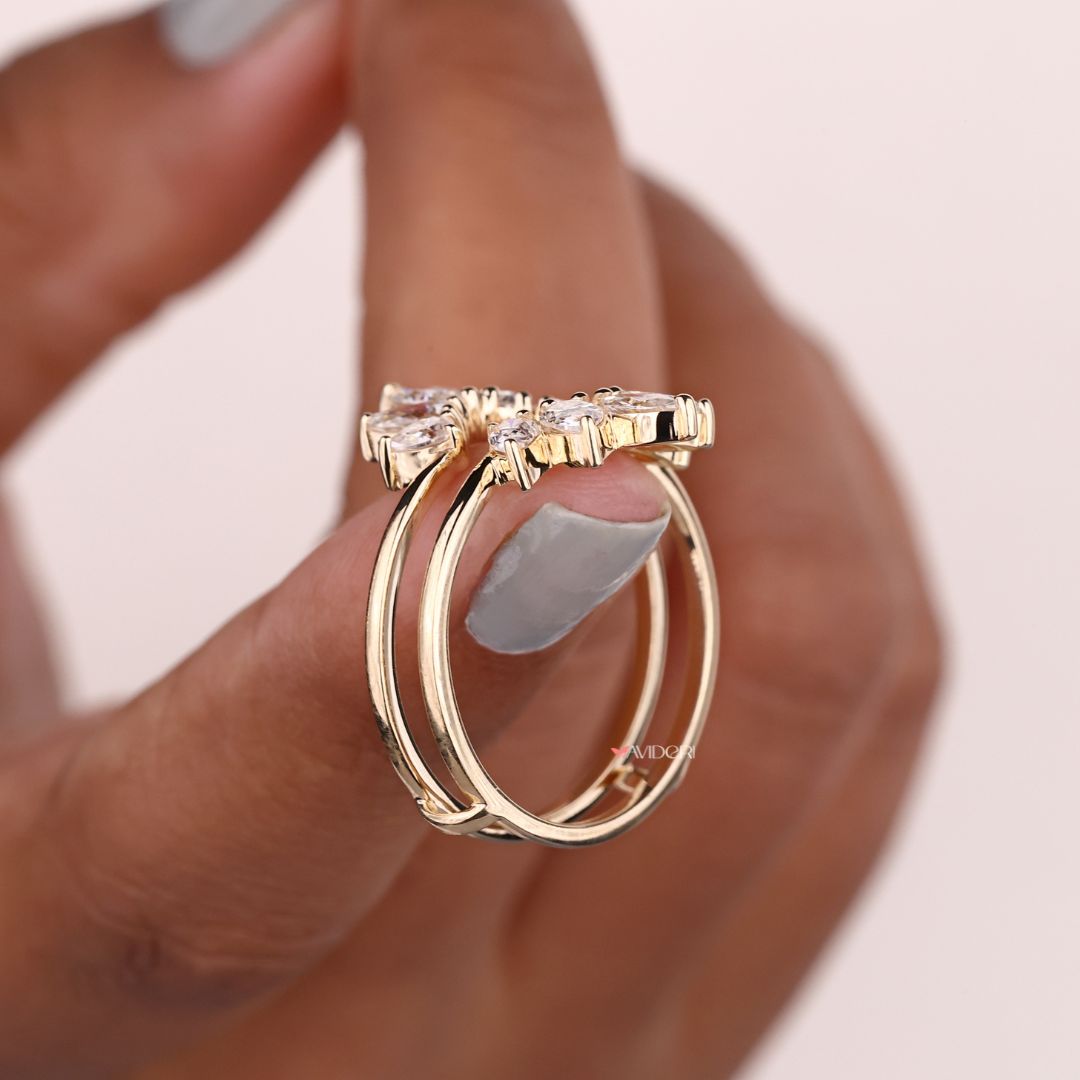 A pear cut band adds a classic touch to any design.