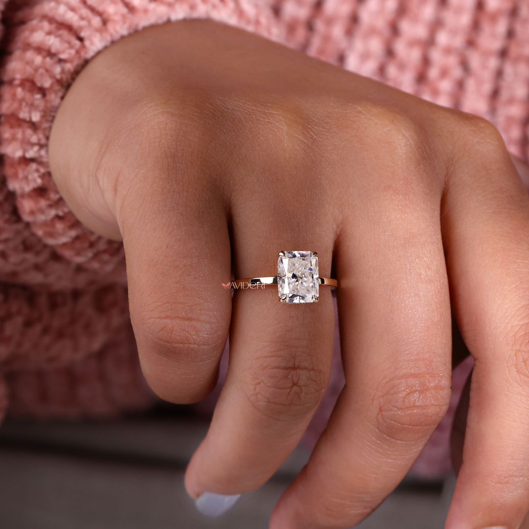 Yellow gold moissanite ring for a warm, classic look.