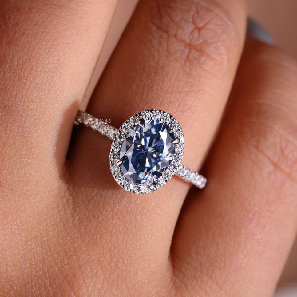 Gold oval cut moissanite ring with a stunning design.