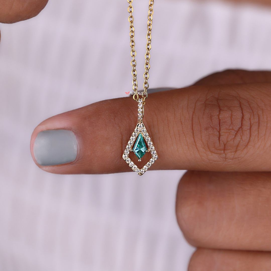 Custom halo pendant featuring a blue moissanite center.