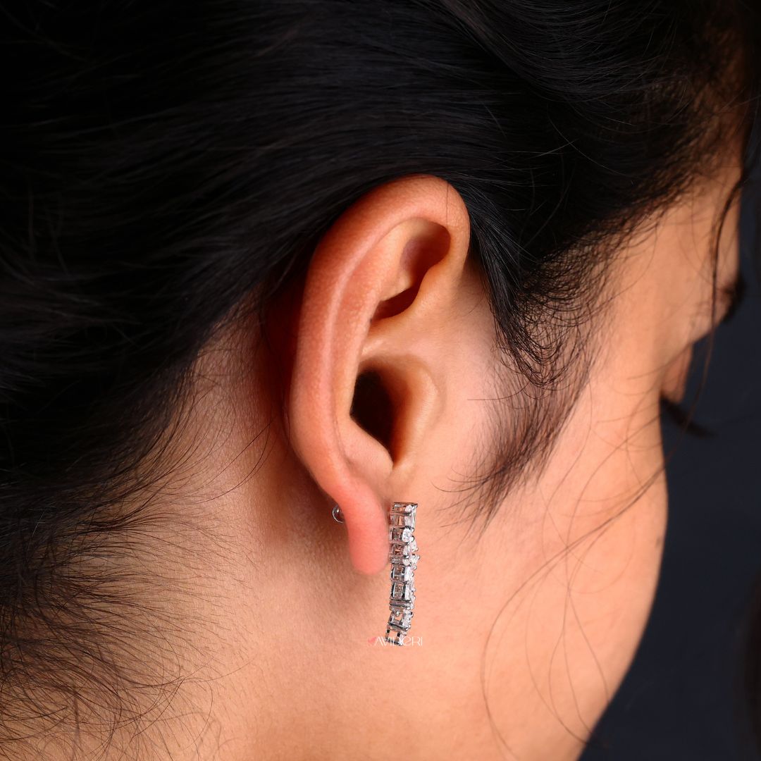 Moissanite Hanging Earrings, featuring hanging Moissanite stones for a delicate, shimmering effect.