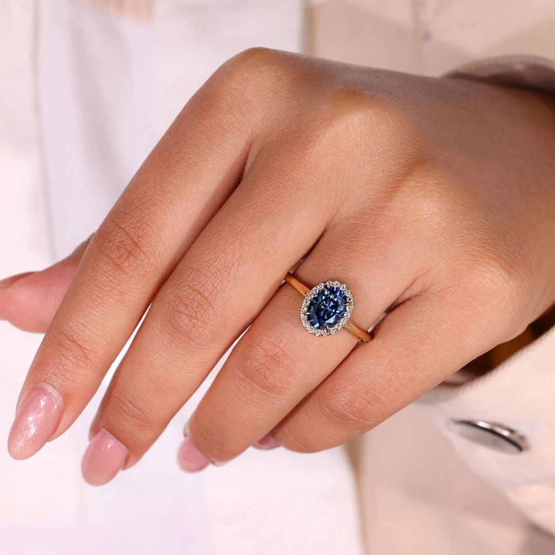 This round cut halo setting glows with symmetry and light, perfect for special moments.