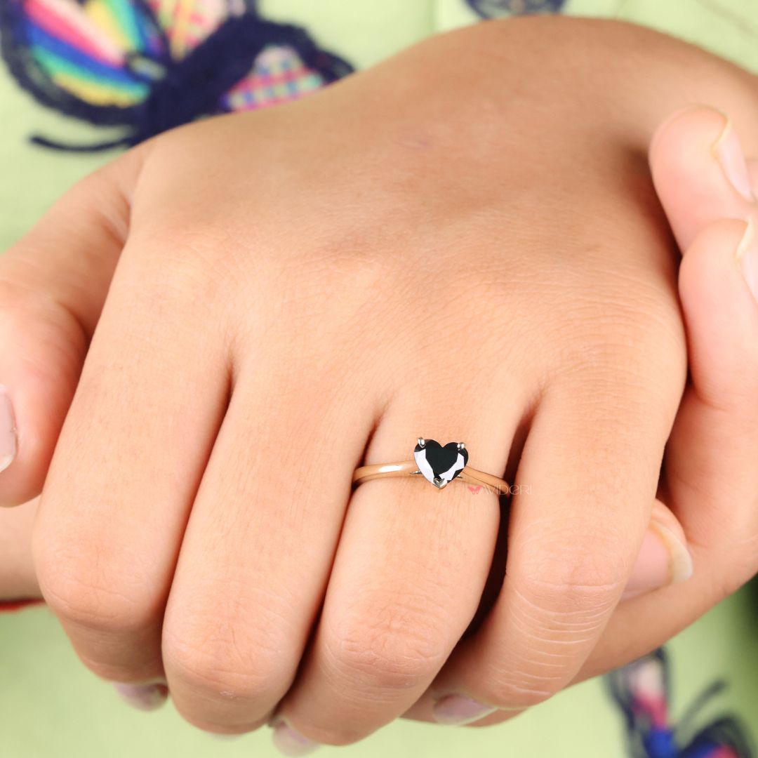 Yellow gold engagement ring showcasing a beautiful heart cut stone