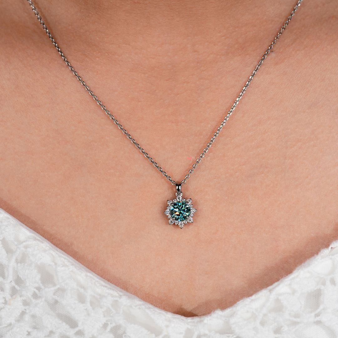 Halo cluster diamond pendant in handmade jewelry style.