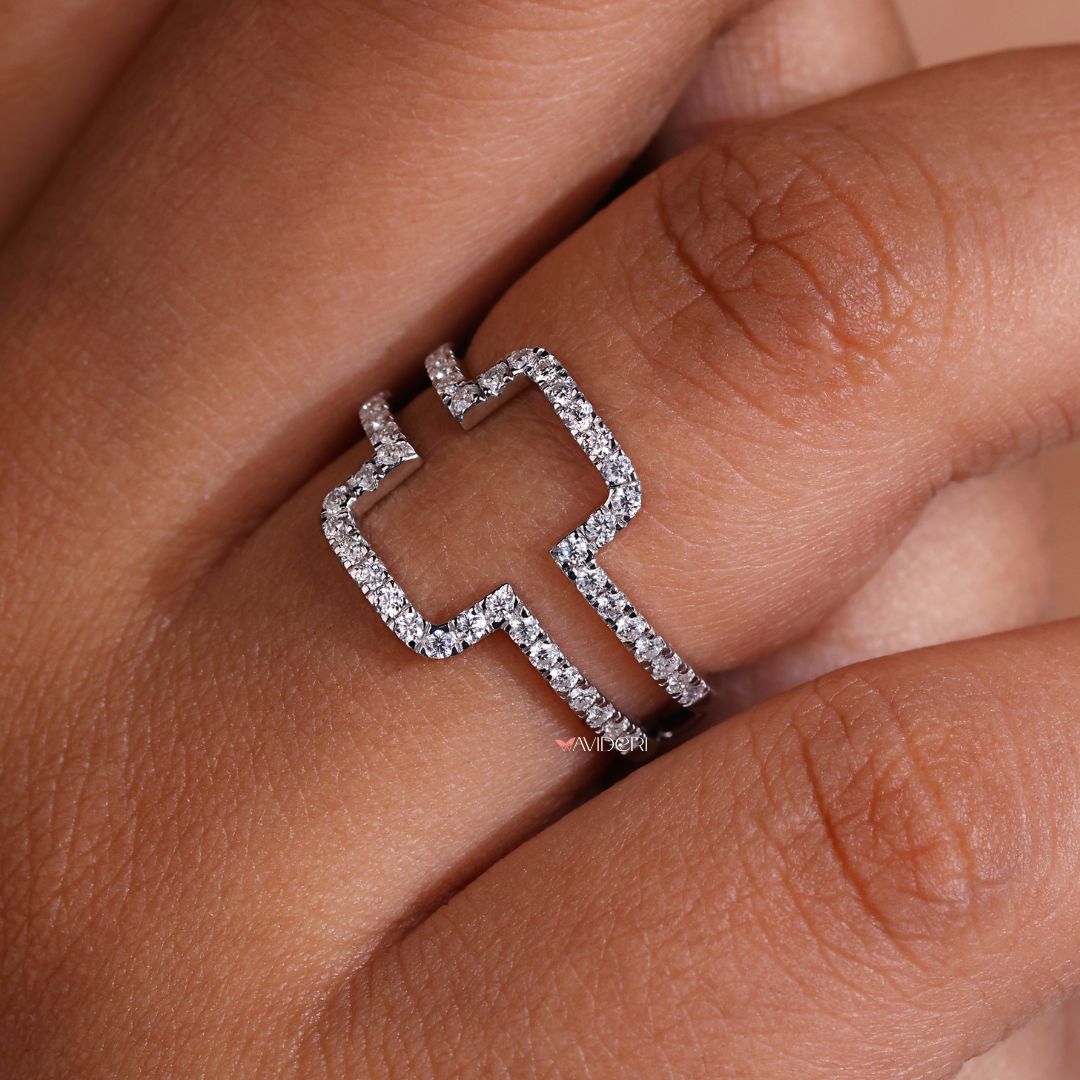 Round cut wedding band offers timeless elegance with clean lines and radiant cut stones.