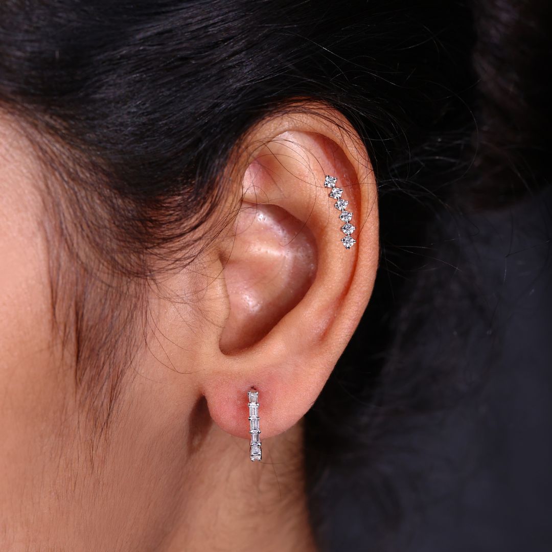 Handmade earrings made with lab grown diamonds, styled for a modern aesthetic.