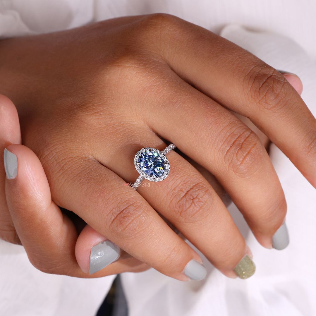 Halo pave setting ring with a dazzling stone centerpiece.