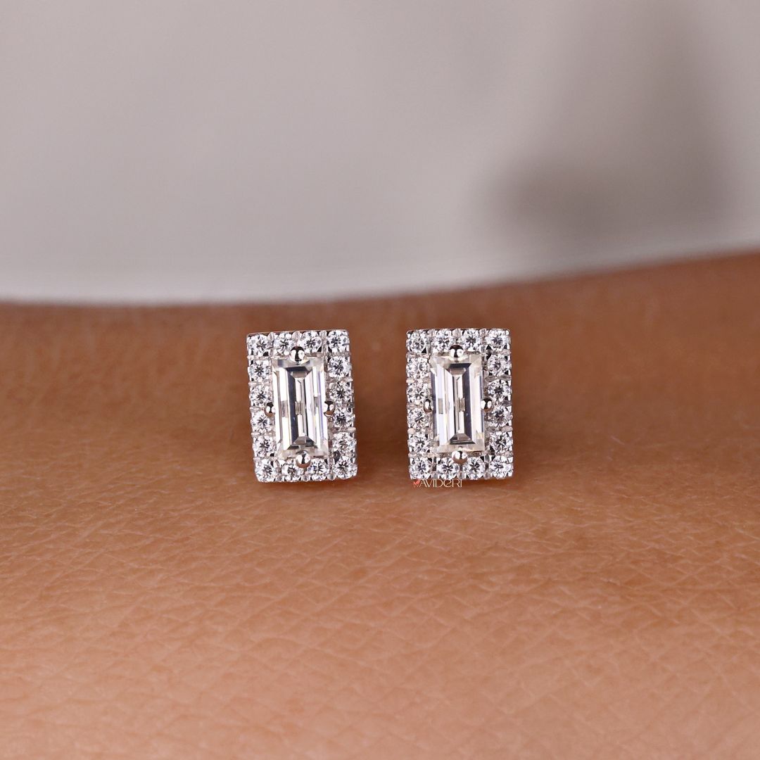 Round cut halo earrings featuring baguette cut Moissanite for a unique touch.