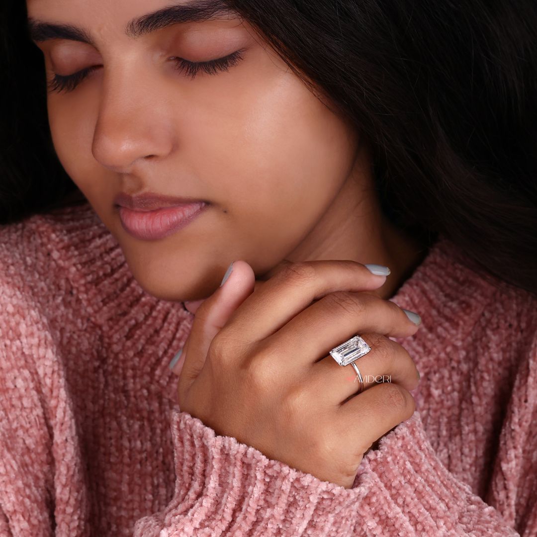 Emerald cut white gold ring designed for modern elegance.
