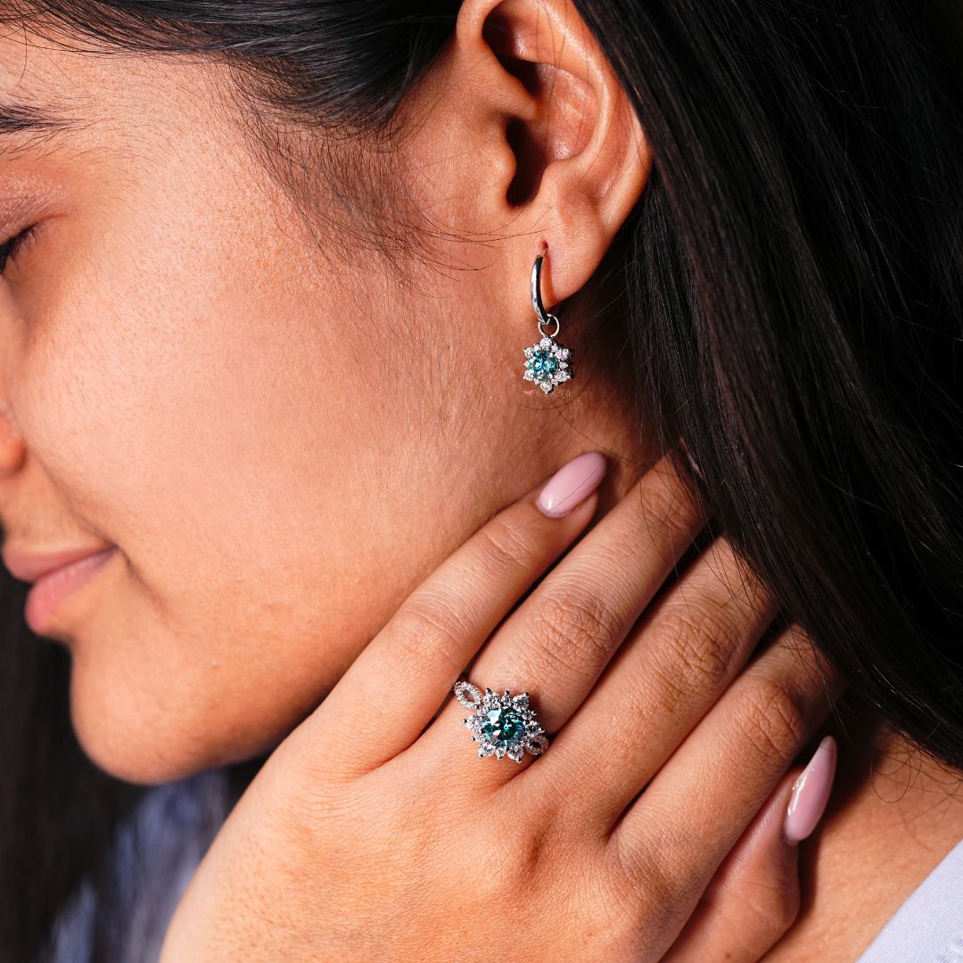 Elegant round cut diamond earrings designed to shine at every occasion.