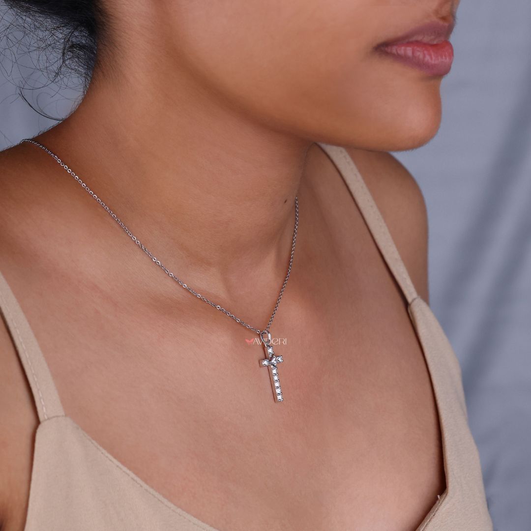 Handmade jewelry showcasing a white gold cross