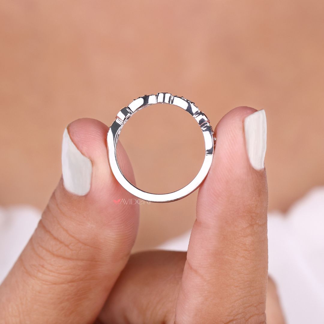 Designer wedding band blends luxurious details with artistic craftsmanship for a personalized look.