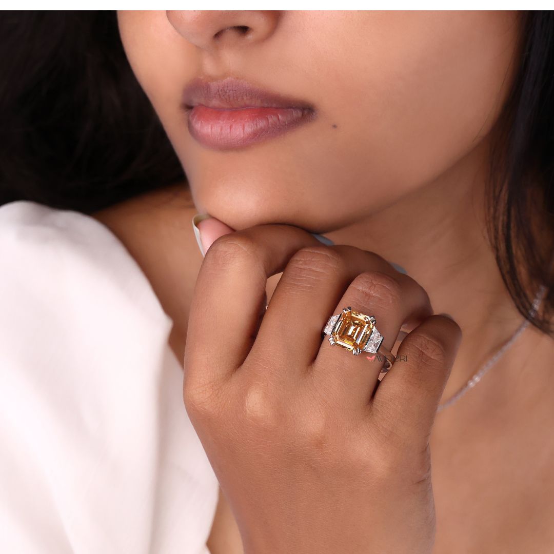 3 stone cathedral engagement ring featuring elegant arches.