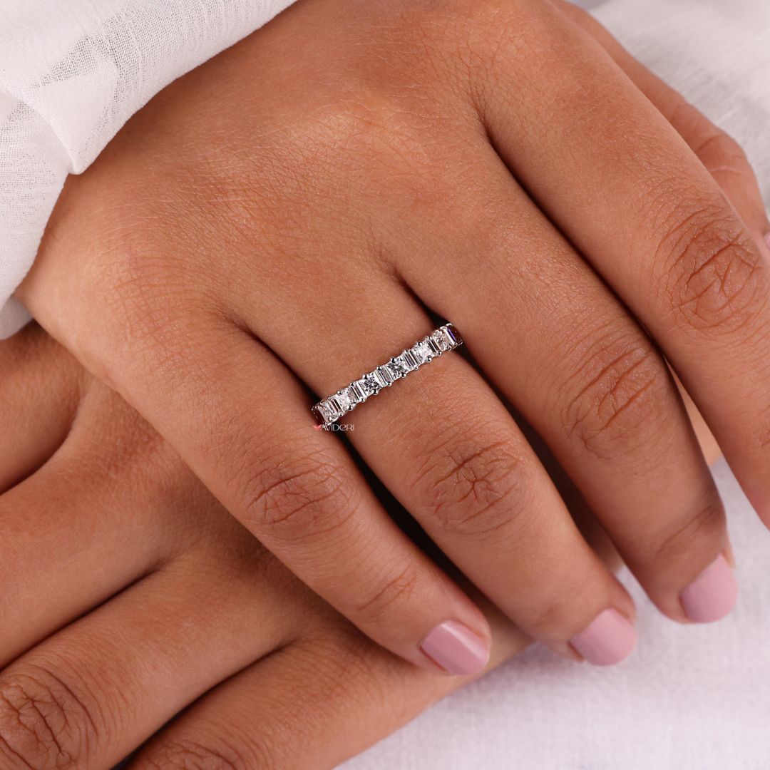 Designer wedding band combines luxurious craftsmanship with intricate design elements.
