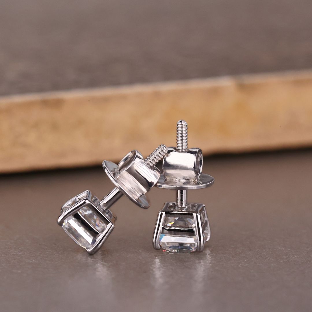 White gold stud earrings give a sleek, polished look.