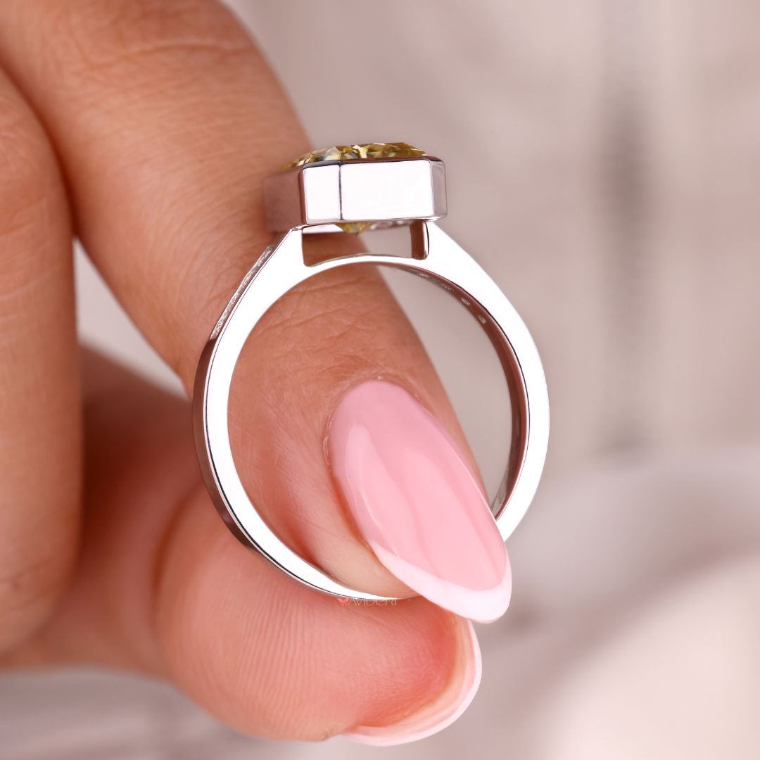 White gold engagement ring featuring a radiant cut stone