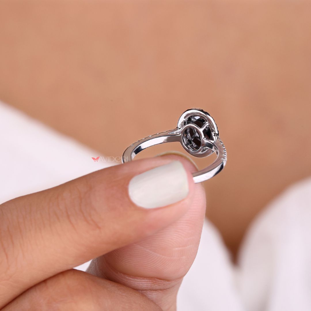 Cathedral setting ring with oval moissanite for a sophisticated look.