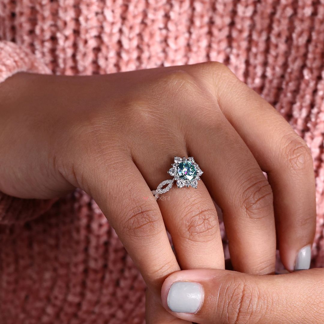 Round cut engagement ring with a halo engagement ring in white gold for a stunning design.