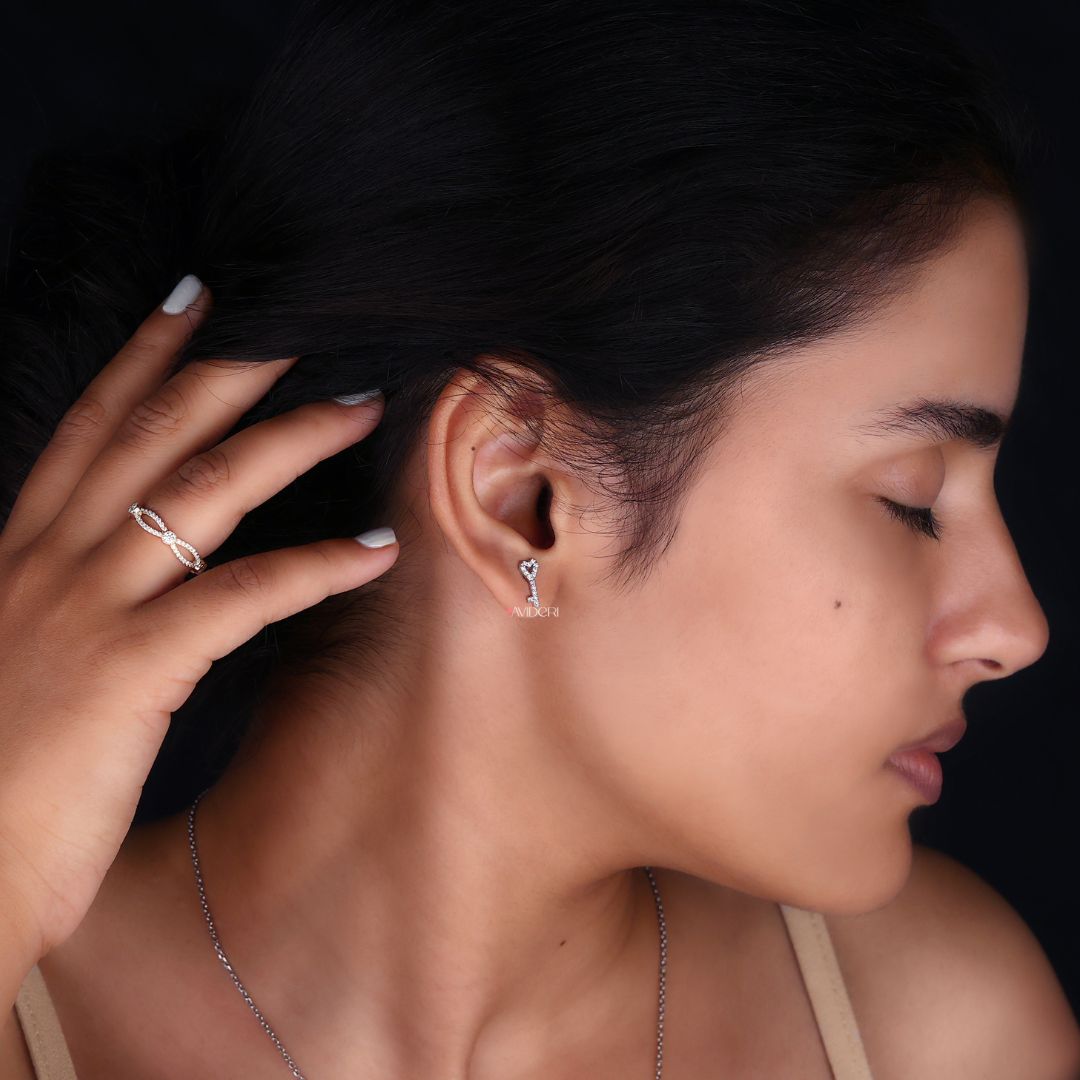 Moissanite Hanging Earrings, featuring hanging Moissanite stones for a delicate, shimmering effect.