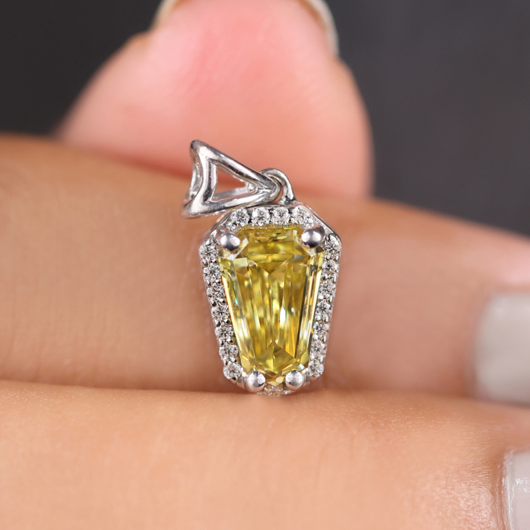 Halo pendant enhances center stone with graceful beauty.