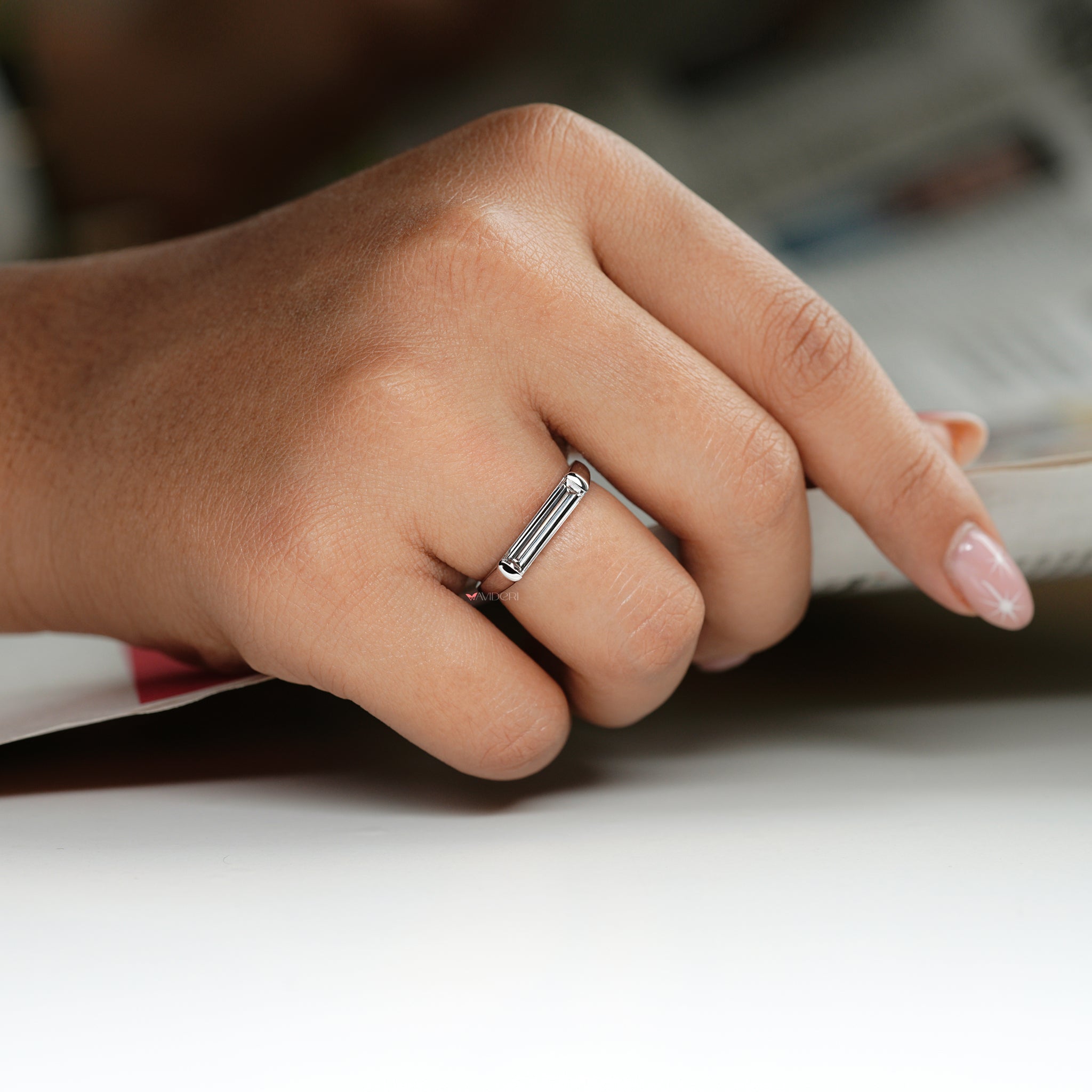 Stunning baguette engagement ring crafted for special moments and celebrations.