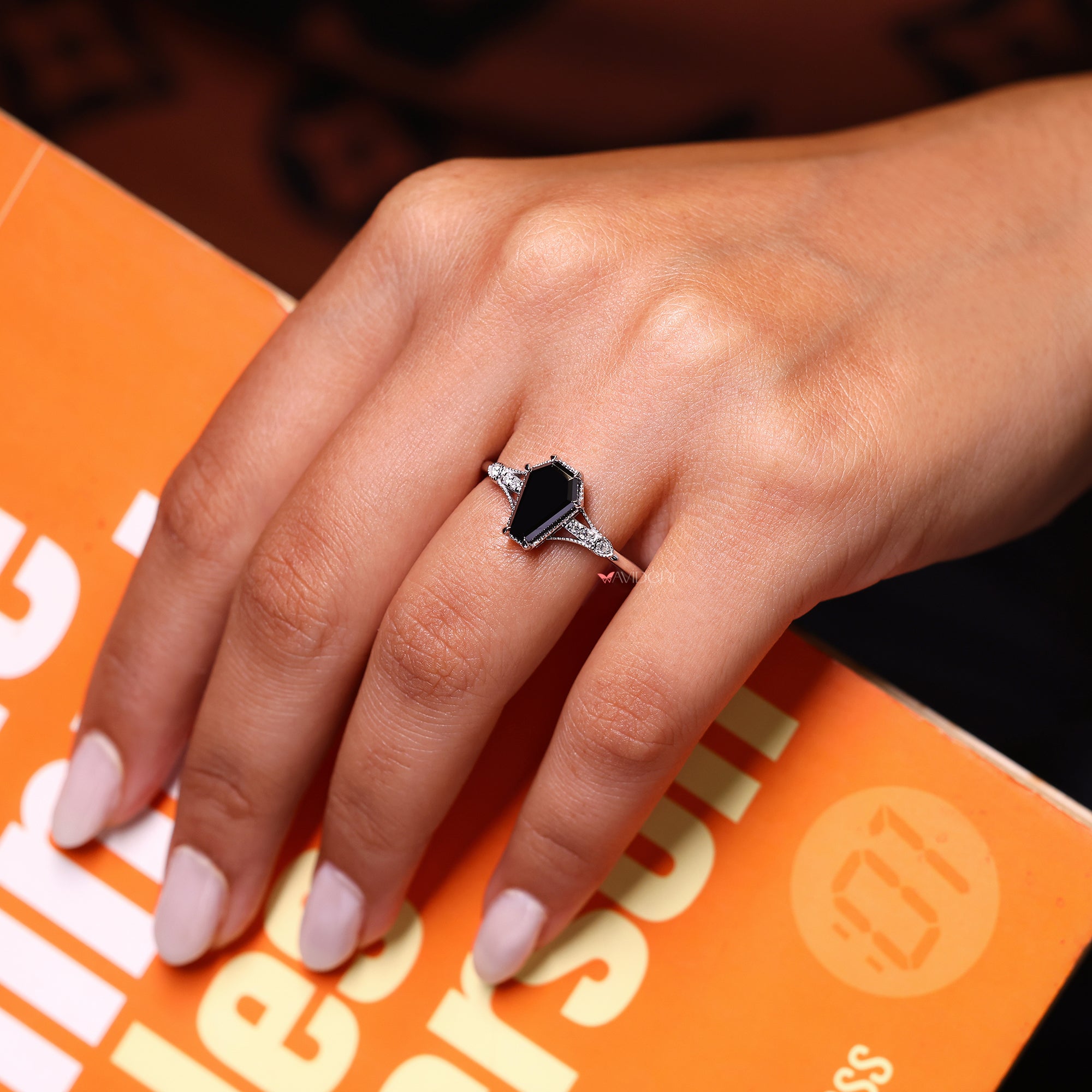 Coffin ring with a bold and striking look, perfect for any occasion.