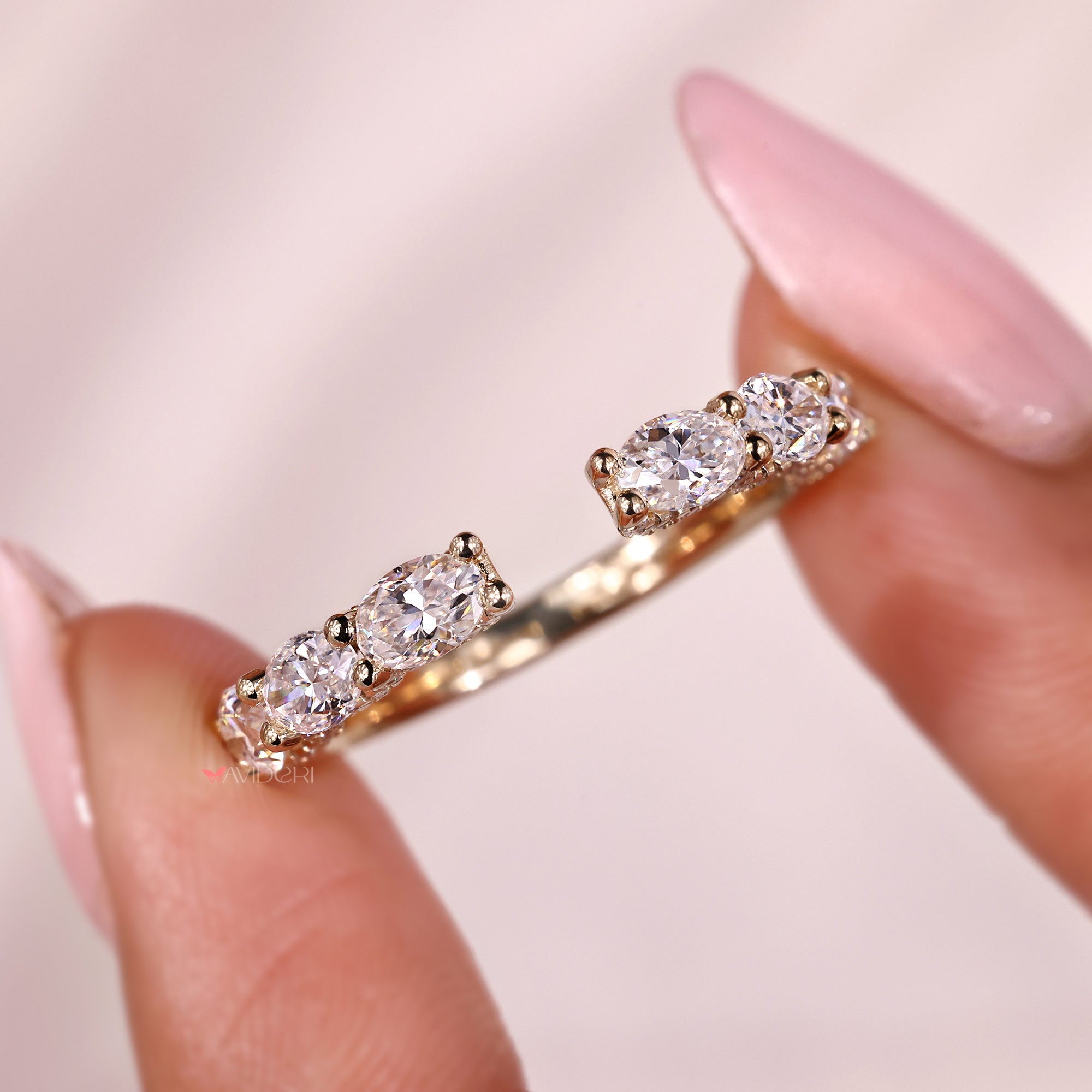 Shared prong wedding band with moissanite wedding band.