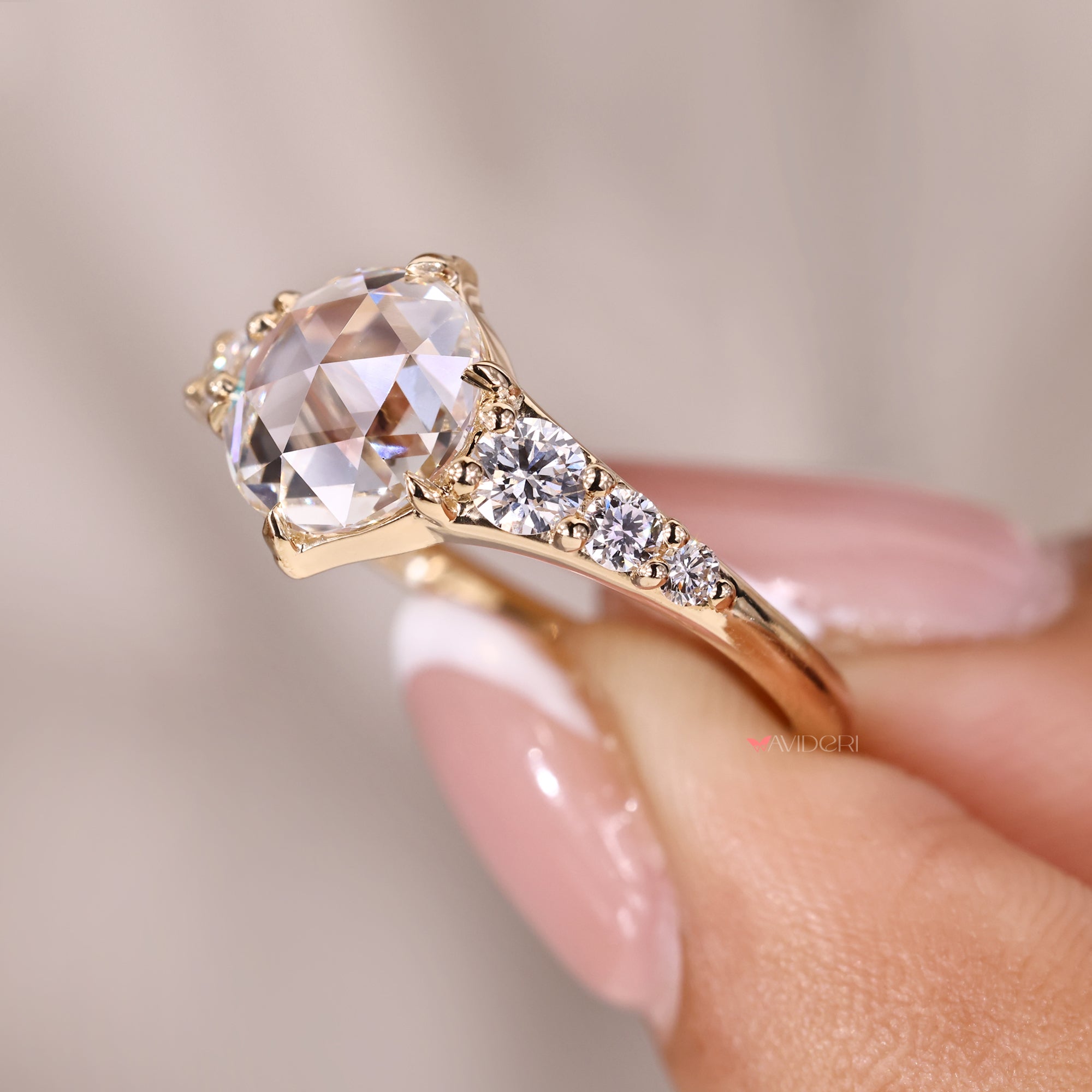 Tapered shank ring in yellow gold diamond ring.