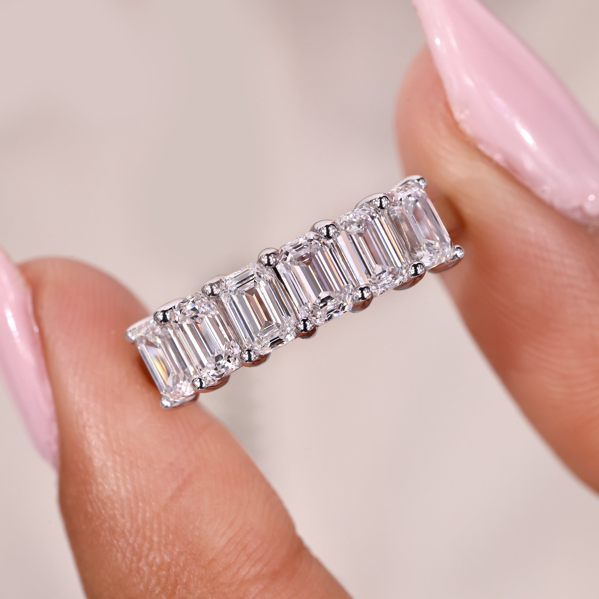 Avideri band with emerald cut lab diamonds.