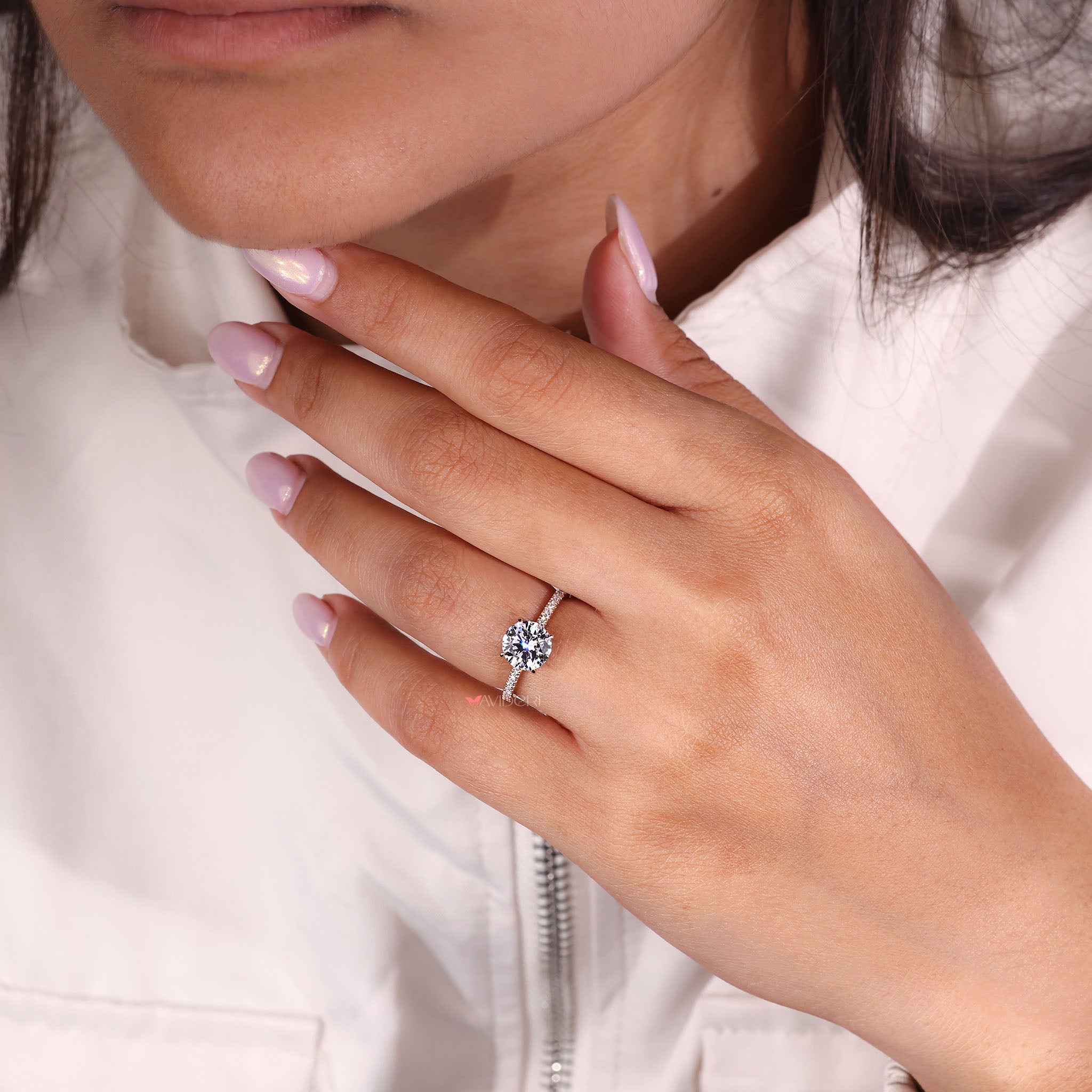 Round diamond ring paired with round diamond hidden halo for a Custom Engagement Ring.