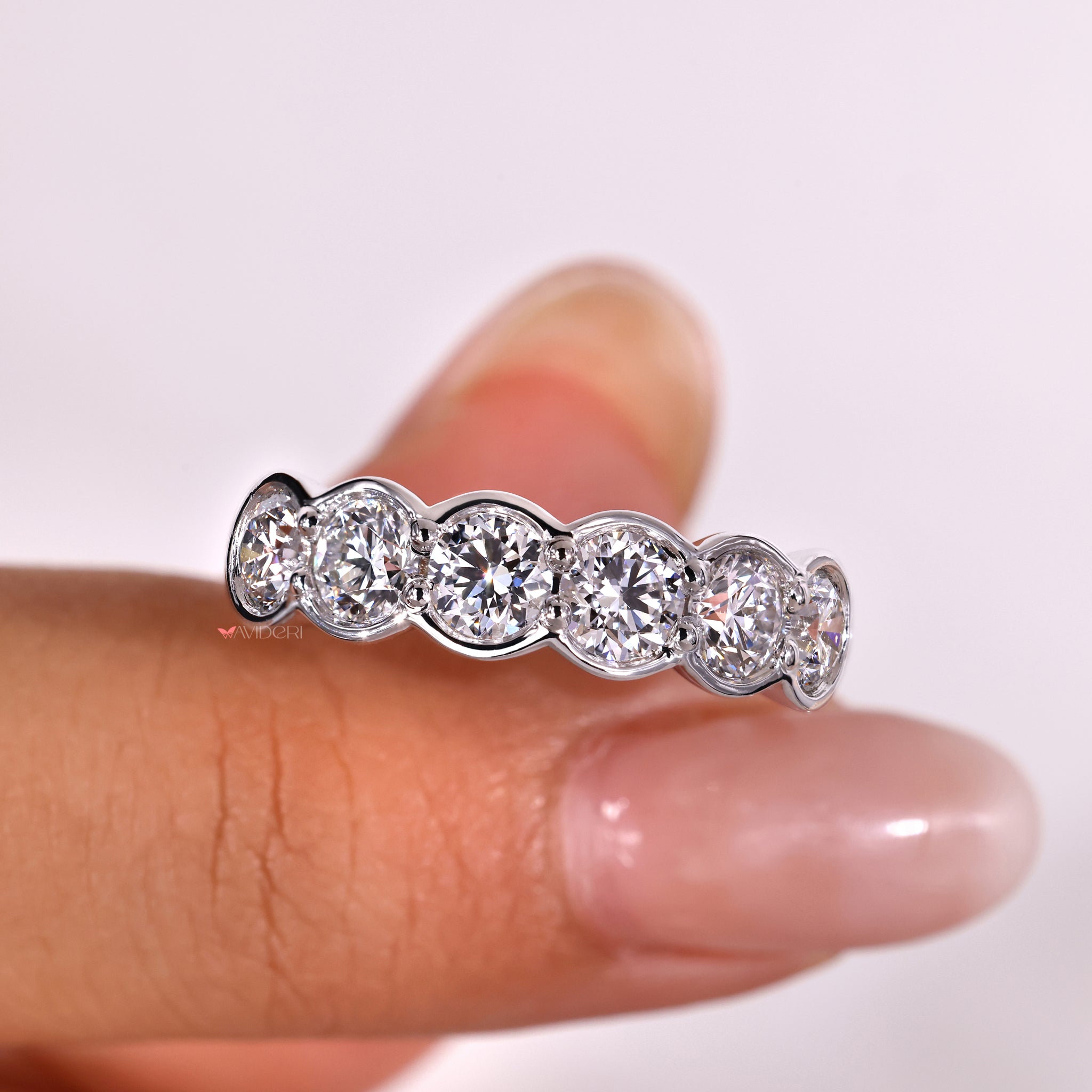 Eternity bands round diamonds for a luxurious touch.