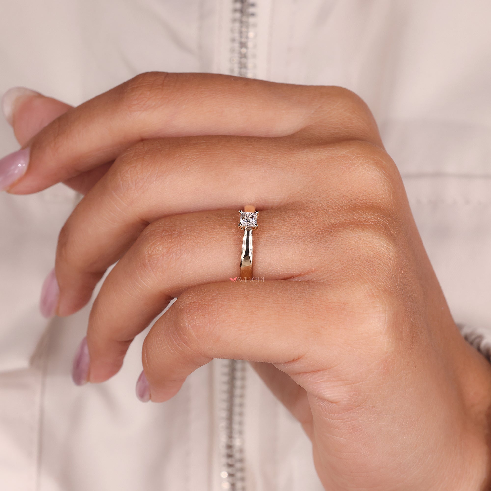 Tapered shank engagement ring with a princess diamond, designed for a clean and modern look.