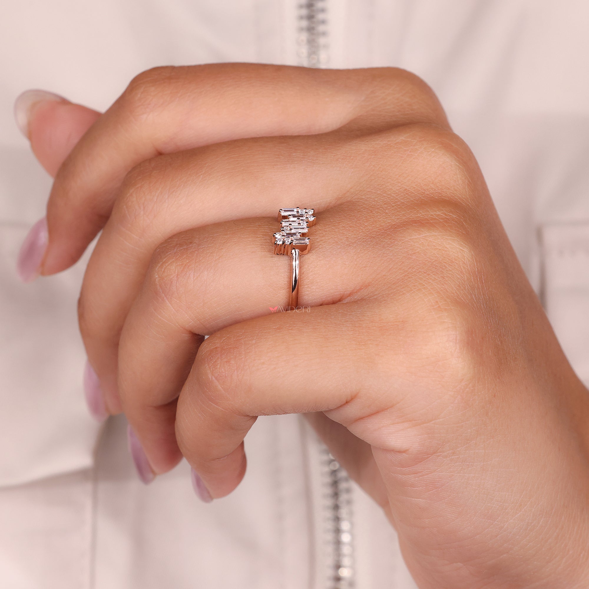 Buy an engagement ring featuring a round diamond, ideal for a special proposal.