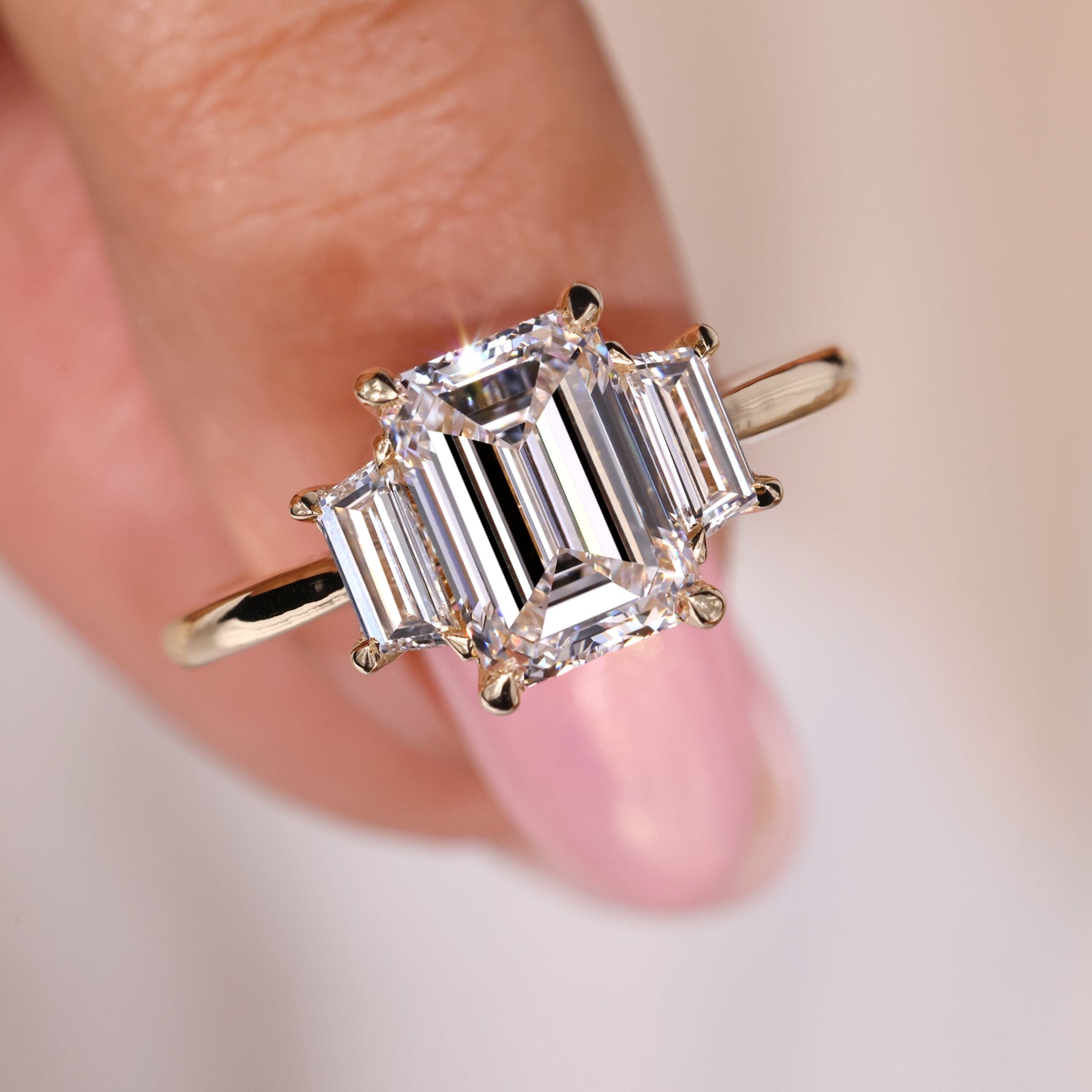 Emerald cut diamond ring featuring an elegant emerald engagement ring design.