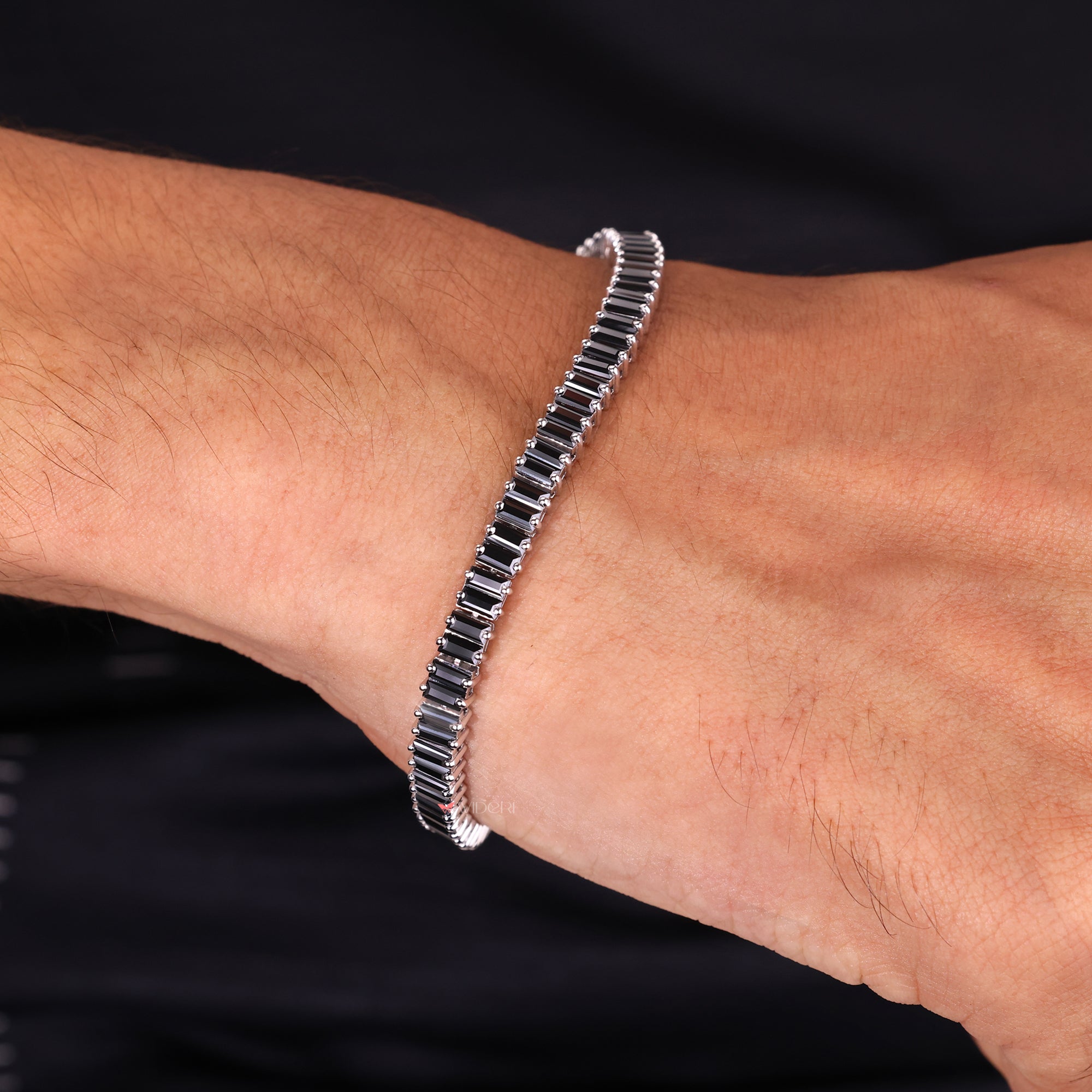 Elegant white gold bracelet featuring black moissanite.