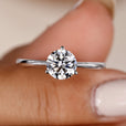Solitaire diamond ring featuring a timeless design, perfect for engagements and showcasing the brilliance of a single diamond.