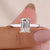 Emerald cut engagement ring with lab grown diamond in a classic prong setting.
 Emerald cut engagement ring with lab grown diamond in a classic prong setting.