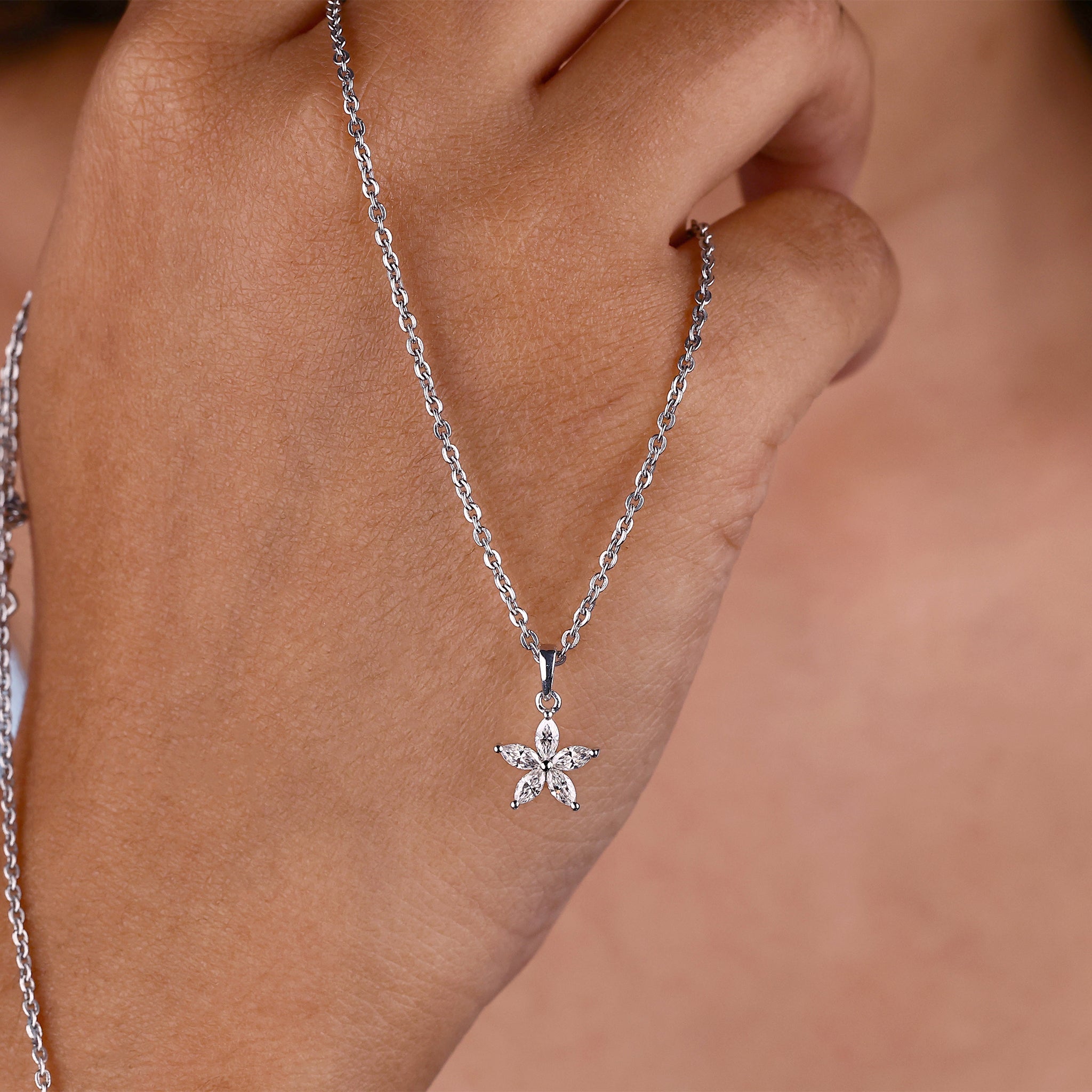 White Gold Pendant, offering a classic and sophisticated look with a radiant gemstone.