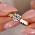 A stunning round cut diamond ring with brilliant sparkle.