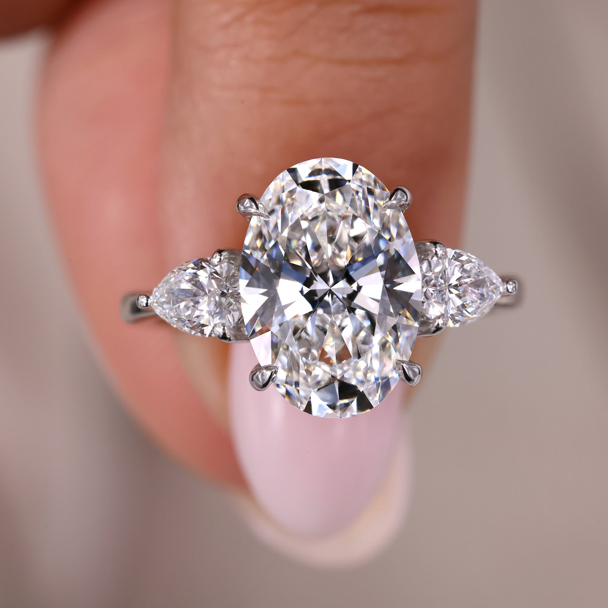 Handmade ring with a three stone oval design for a personalized touch.