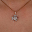 Sunflower round brilliant cut moissanite pendant with a floral design.